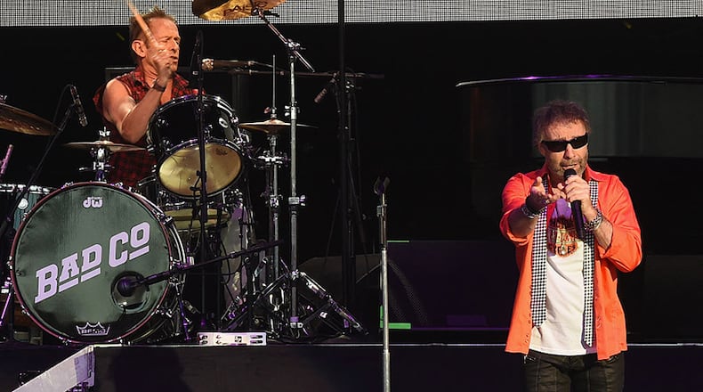 WEST PALM BEACH, FL - MAY 29:  Founding members Simon Kirke (drums) and Paul Rodgers (Lead Singer) of Bad Company perform during Joe Walsh & Bad Company One Hell Of A Night Tour - at Perfect Vodka Amphitheatre on May 29, 2016 in West Palm Beach, Florida.  (Photo by Rick Diamond/Getty Images)