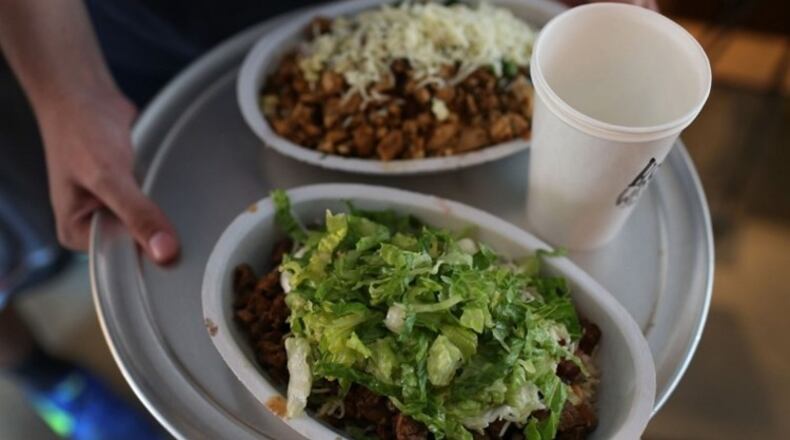 Customers of Columbus Chipotle restaurants can earn a free entree in a new customer loyalty program. (Photo by Joe Raedle/Getty Images)