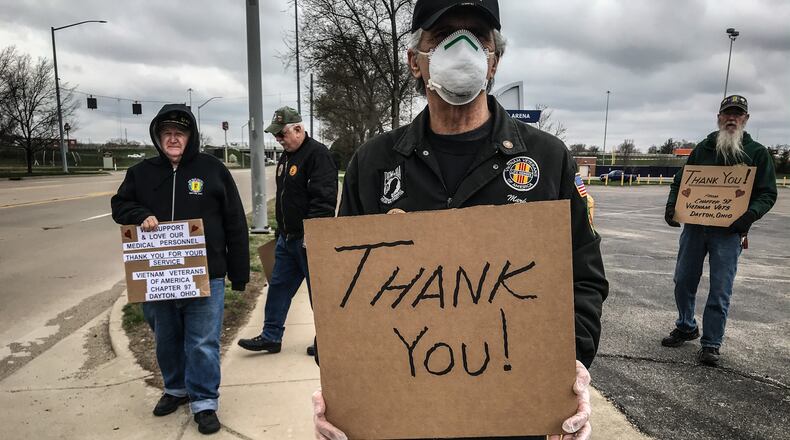 Vietnam Veterans Memorial Park President, Mark Kucharski along with other Miami Valley Vietnam veterans, thank the doctors and nurses testing people at UD Arena Wednesday morning. Food was also delivered by the Olive Garden on Miller Lane. JIM NOELKER/STAFF