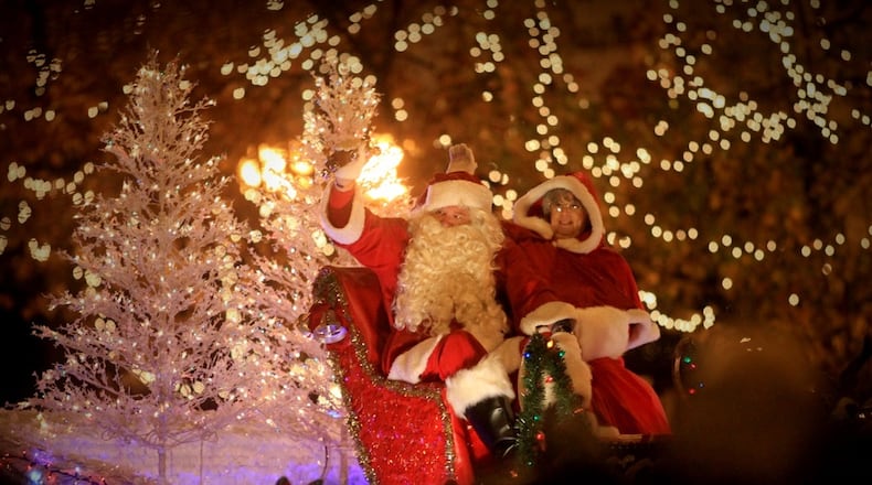 Santa Claus is always the highlight of the Children’s Parade, the kickoff event each year to the Dayton Holiday Festival at Courthouse Square in downtown Dayton. JIM NOELKER / STAFF