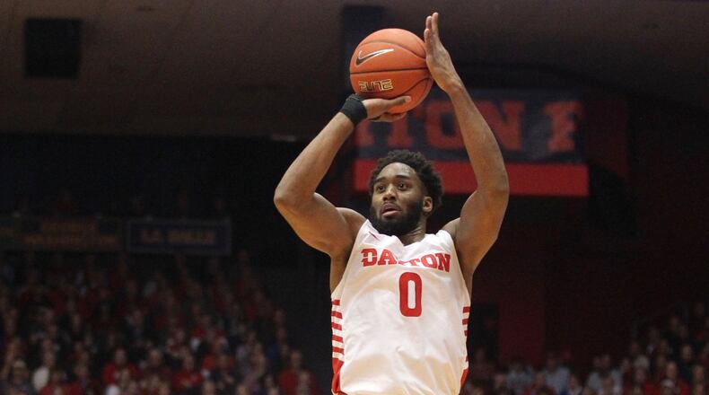 Dayton’s Josh Cunningham shoots against Mississippi State on Friday, Nov. 30, 2018, at UD Arena. David Jablonski/Staff