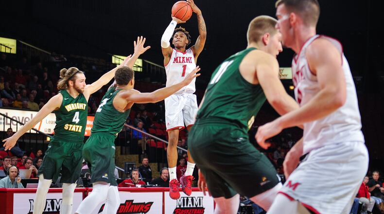 Miami’s Nike Sibande shoots a jumper during their game Tuesday, Nov. 14 at Millett Hall on the Miami University Campus in Oxford. The Miami University Redhawks basketball team defeated the Wright State Raiders 73-67 in overtime. NICK GRAHAM/STAFF