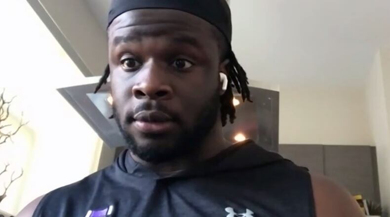 In this photo taken from video, Minnesota Vikings NFL football team defensive end Ifeadi Odenigbo talks on a conference call from his home in Chicago, Thursday, May 21, 2020. Odenigbo’s progression from the practice squad accelerated last season with regular playing time and made an even bigger leap forward this spring when stalwart Everson Griffen did not re-sign with the team. (Dave Campbell via Zoom)