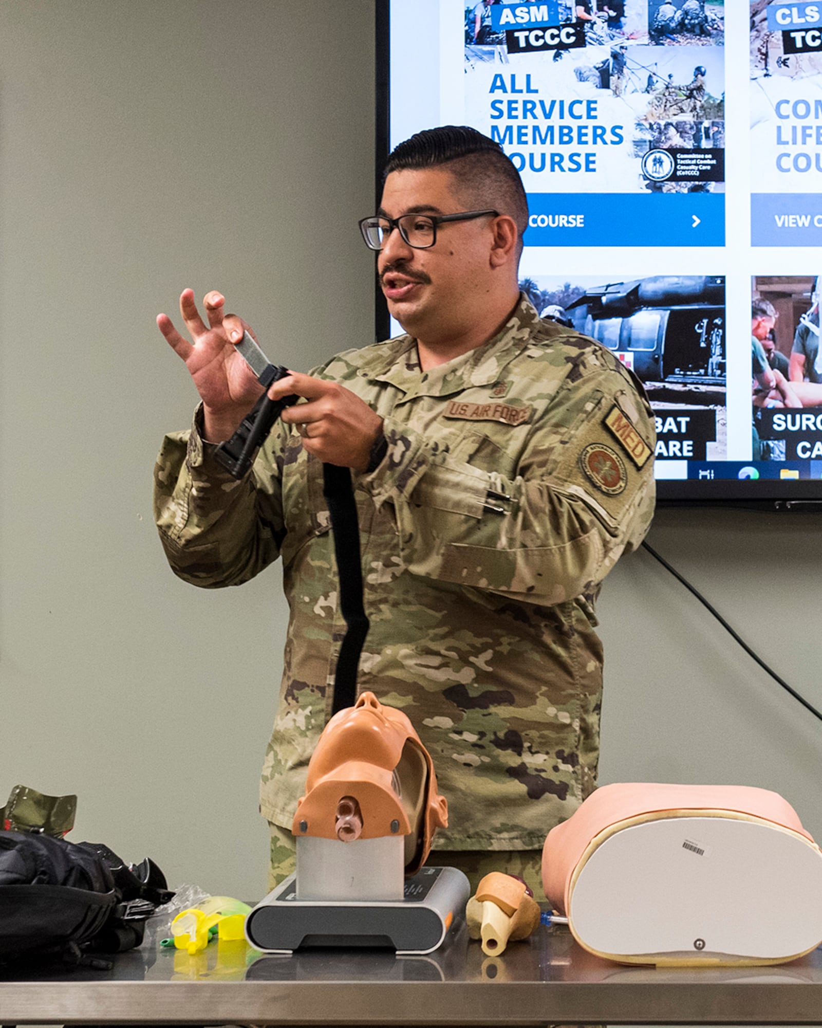 Tech. Sgt. Michael Fromme, 88th Medical Group, demonstrates use of the combat-application tourniquet to LEADership Wright-Patt students on May 3 at Wright-Patterson Air Force Base. Students took part in medical readiness and simulation activities as part of the Leadership Wright-Patt program. U.S. AIR FORCE PHOTO/JAIMA FOGG