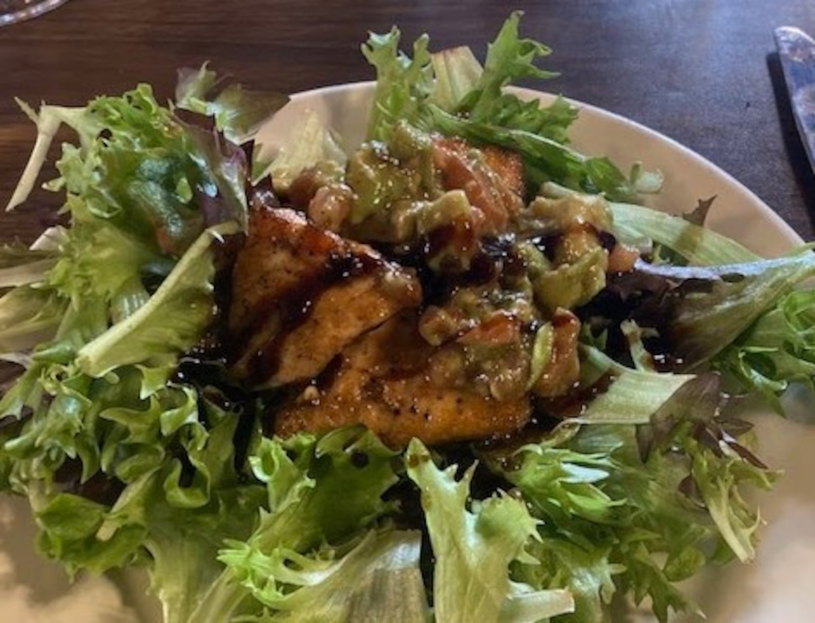 Jay's Seafood Restaurant in Dayton serves a seared salmon salad with avocado vinaigrette. RAY MARCANO/CONTRIBUTED