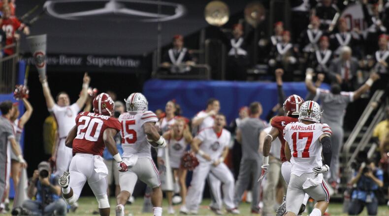 Ohio State’s Ezekiel Elliott (15) runs 85 yards for a touchdown against Alabama in the Sugar Bowl on Thursday, Jan. 1, 2015, at the Superdome in New Orleans. David Jablonski/Staff