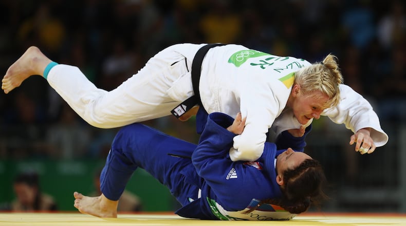 RIO DE JANEIRO, BRAZIL - AUGUST 11: Kayla Harrison of the United States competes against Zhehui Zhang of China during the women’s -78kg elimination round judo contest on Day 6 of the 2016 Rio Olympics at Carioca Arena 2 on August 11, 2016 in Rio de Janeiro, Brazil. (Photo by Julian Finney/Getty Images)