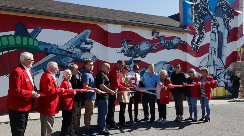 Judge Amy H. Lewis and The Greene County Juvenile Court held a Fairborn History of Aviation mural dedication ceremony, Friday, Oct. 18, 2024. MARSHALL GORBY\STAFF