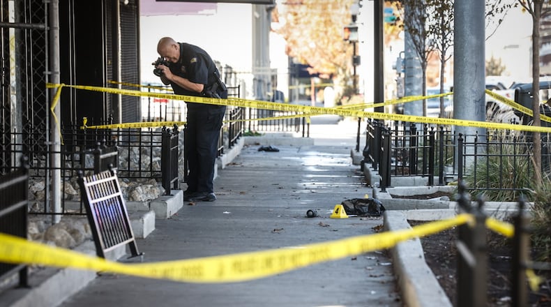 A man is in critical condition after being shot on South Jefferson Street in Dayton Monday afternoon November 11, 2024. Dayton police arrived in minutes and helped the victim. A suspect is in custody. JIM NOELKER/STAFF