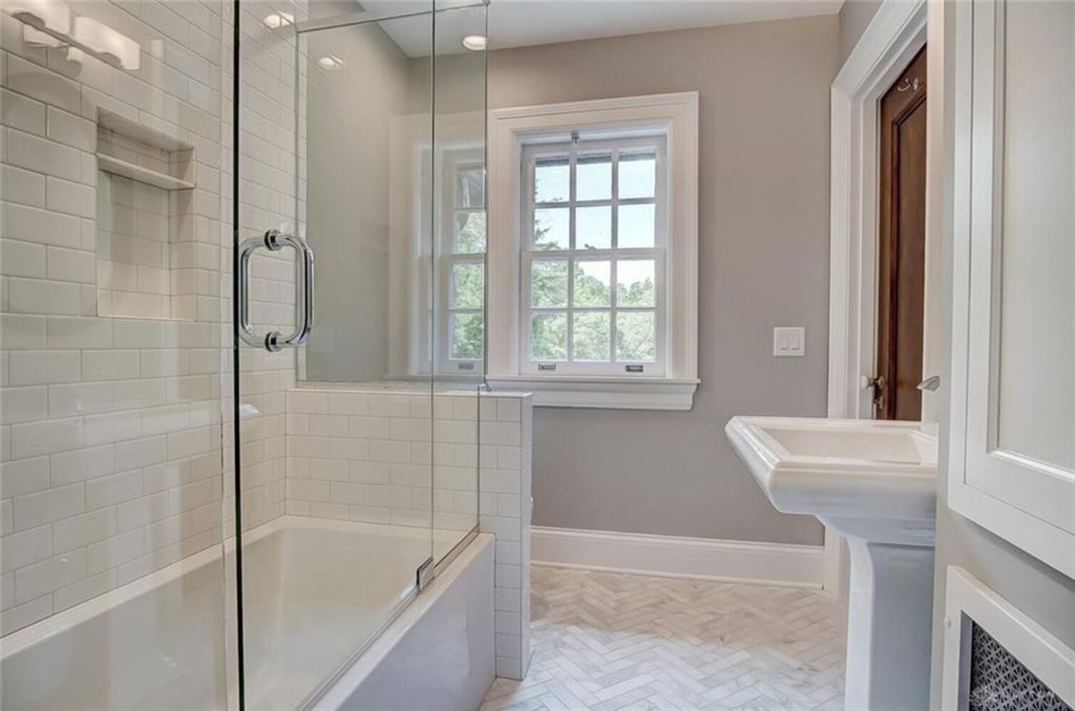 PHOTOS: Luxury, renovated Oakwood Tudor home on market for nearly $1.2M