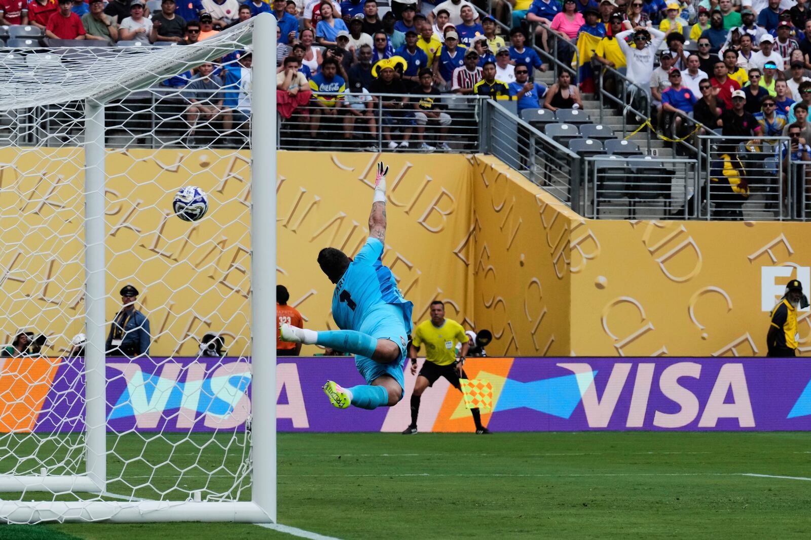 Fluminense goalkeeper Fabio (1) can't stop a goal by Chelsea's João Pedro during the Club World Cup semifinal soccer match between Fluminense and Chelsea in East Rutherford, N.J., Tuesday, July 8, 2025. (AP Photo/Seth Wenig)
