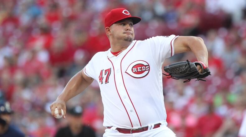Reds starter Sal Romano pitches aagainst the Brewers on Friday, June 29, 2018, at Great American Ball Park in Cincinnati. David Jablonski/Staff
