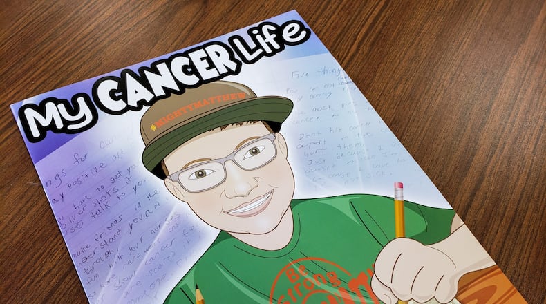 Sarah Curry Rathel and illustrator Bob Kelly, with Smile Books Project, created the book, “My Cancer Life,” to tell the story of Matthew Harrison, a sixth-grader at Chamberlain Middle School in Carlisle and his life dealing with Leukemia. NICK GRAHAM/STAFF