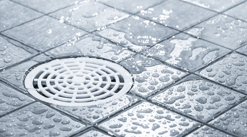 Soap scum buildup and hair are the two main causes of clogged shower drains. (Image source: Thinkstock)