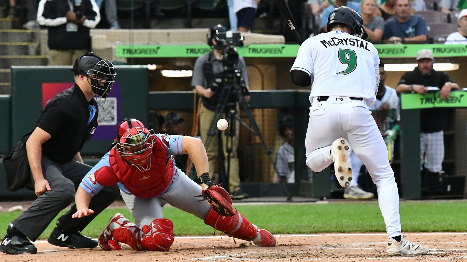 Dayton's Ryan McCrystal avoids a wild pitch that allowed Yerlin Confidan to score in the third inning Saturday night at Day Air Ballpark. JEFF GILBERT/CONTRIBUTED