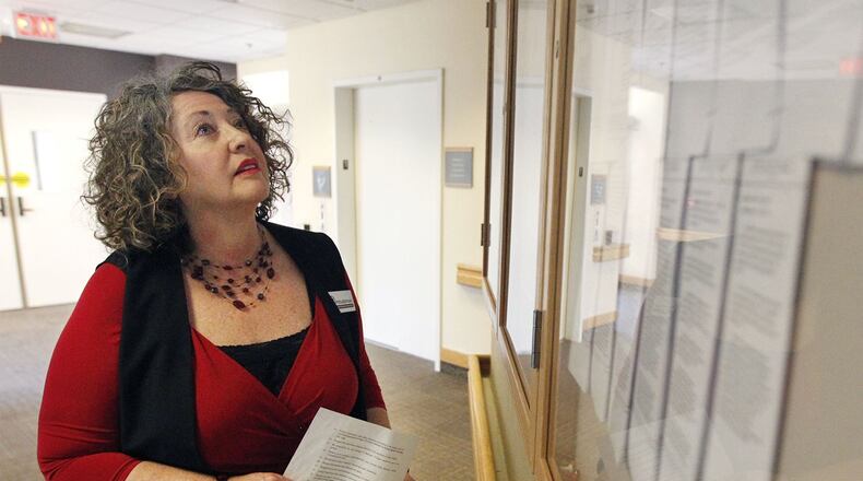 Ombudsman Beverly Baltes visits local nursing or senior care centers to help mediate resident and patient complaints and concerns. The Ombudsman’s office has no regulatory authority but can often prevent state enforcement by working with facility mangers, residents and patients. Here, Baltes checks to make certain that resident/client rights are posted. TY GREENLEES / STAFF