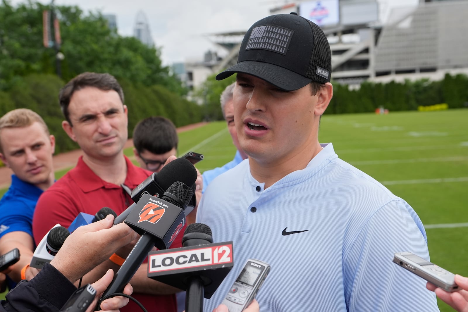 Cincinnati Bengals defensive end Trey Hendrickson speaks to media during NFL football practice on Tuesday, May 13, 2025, in Cincinnati. (AP Photo/Carolyn Kaster)