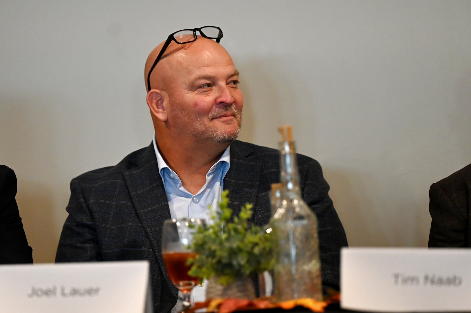 Hamilton City Councilman Joel Lauer reacts to an comment during a debate at the Hamilton Rotary Club on  Oct. 9, 2025. On Tuesday, Nov. 4, 2025, Lauer was re-elected to Hamilton City Council, earning one of the three seats that were up for election. MICHAEL D. PITMAN/STAFF