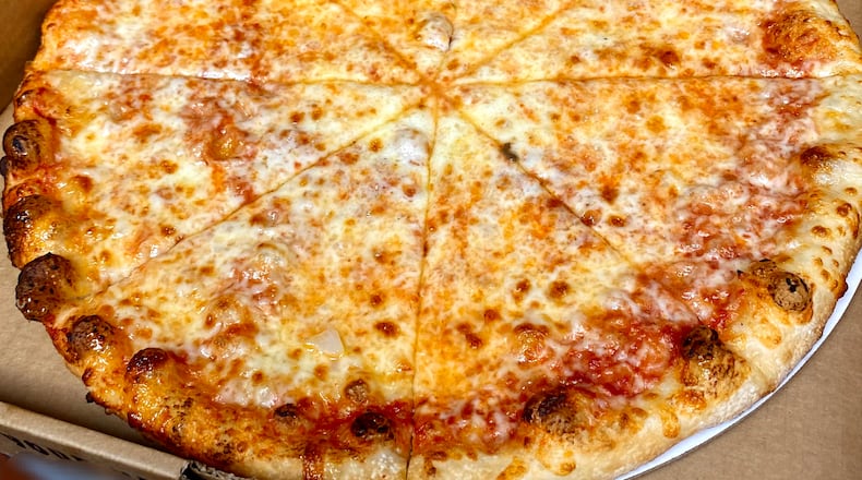 The owners of Beavercreek Pizza Dive, located at 4021 Dayton Xenia Road, are celebrating one year of owning the shop by hosting a free slice extravaganza on Wednesday, May 17 starting at 4 p.m. (CONTRIBUTED PHOTO).