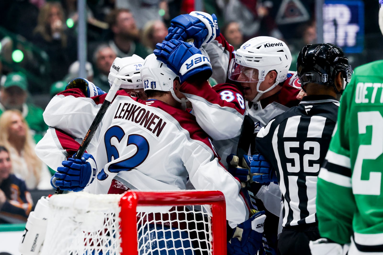 Colorado Avalanche left wing Artturi Lehkonen (62) celebrates with teammates after scoring against the Dallas Stars in the second period during a first-round NHL hockey playoff game in Dallas, Saturday, April 19, 2025. (AP Photo/Gareth Patterson)