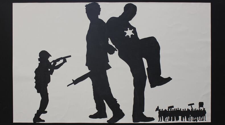 “Evolution of Black Protests in History,” a 2014 work on paper by students from the Dayton Regional STEM School, part of the current “Breathing Deeply, Pushing Back” exhibition at the Dayton Visual Arts Center. CONTRIBUTED