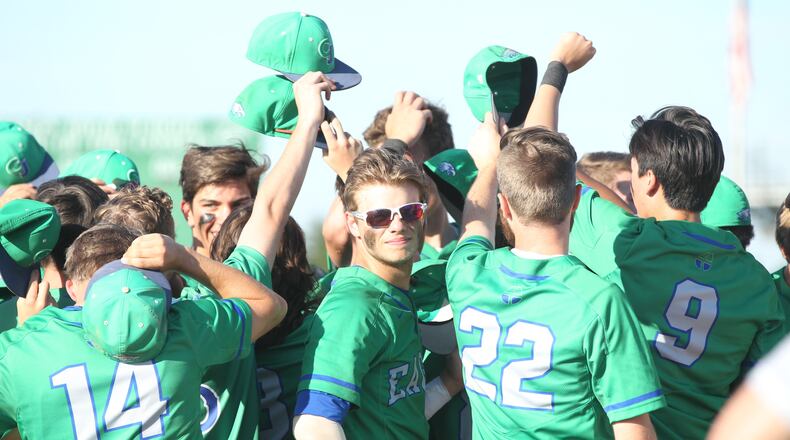 Chaminade Julienne huddles after a victory against Bishop Hartley in a Division II regional semifinal on Thursday, May 24, 2018, at Mason High School. David Jablonski/Staff