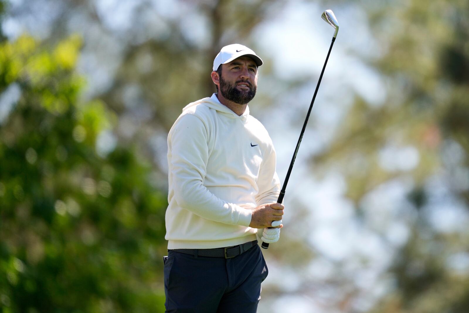 Scottie Scheffler hits from the fourth tee during a practice round at the Masters golf tournament, Tuesday, April 8, 2025, in Augusta, Ga. (AP Photo/Ashley Landis)