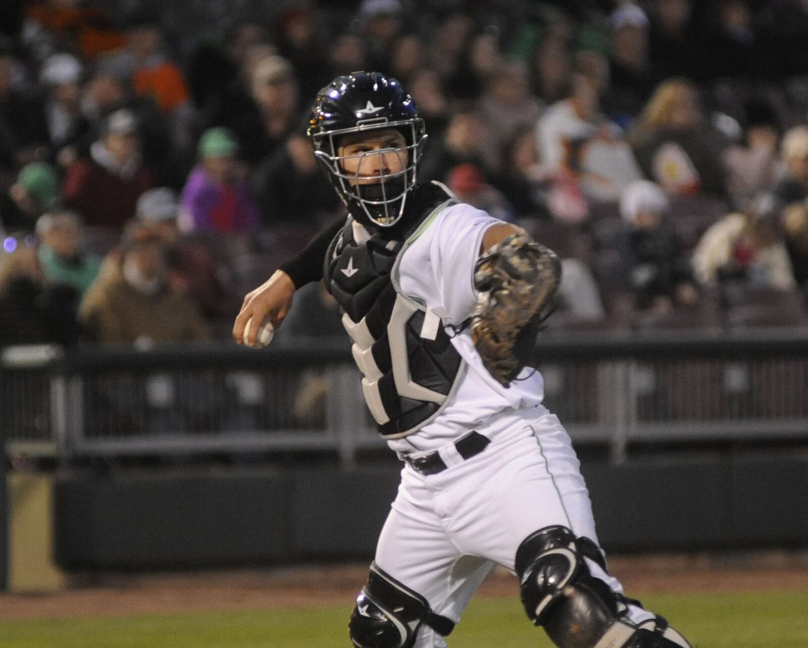 Dragons catcher Mark Kolozsvary makes a putout. The Dragons defeated visiting South Bend 3-2 at Fifth Third Field in Dayton on Thu., April 19, 2018. MARC PENDLETON / STAFF