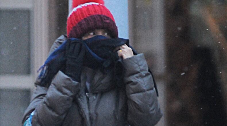 Cold, windy weather hit southwest Ohio early Thursday morning, Dec. 5. MARSHALL GORBY / STAFF