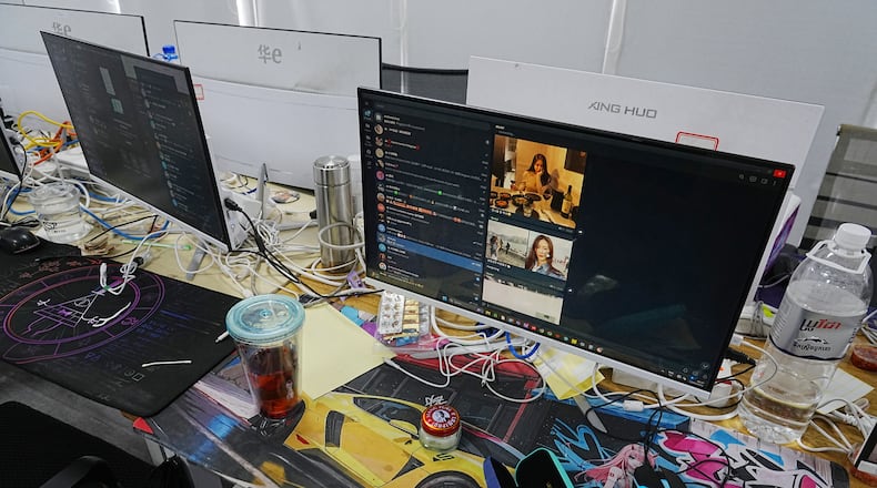 Equipment used at a scam center in Phnom Penh, Cambodia, Wednesday, March 11, 2026. (AP Photo/Heng Sinith)