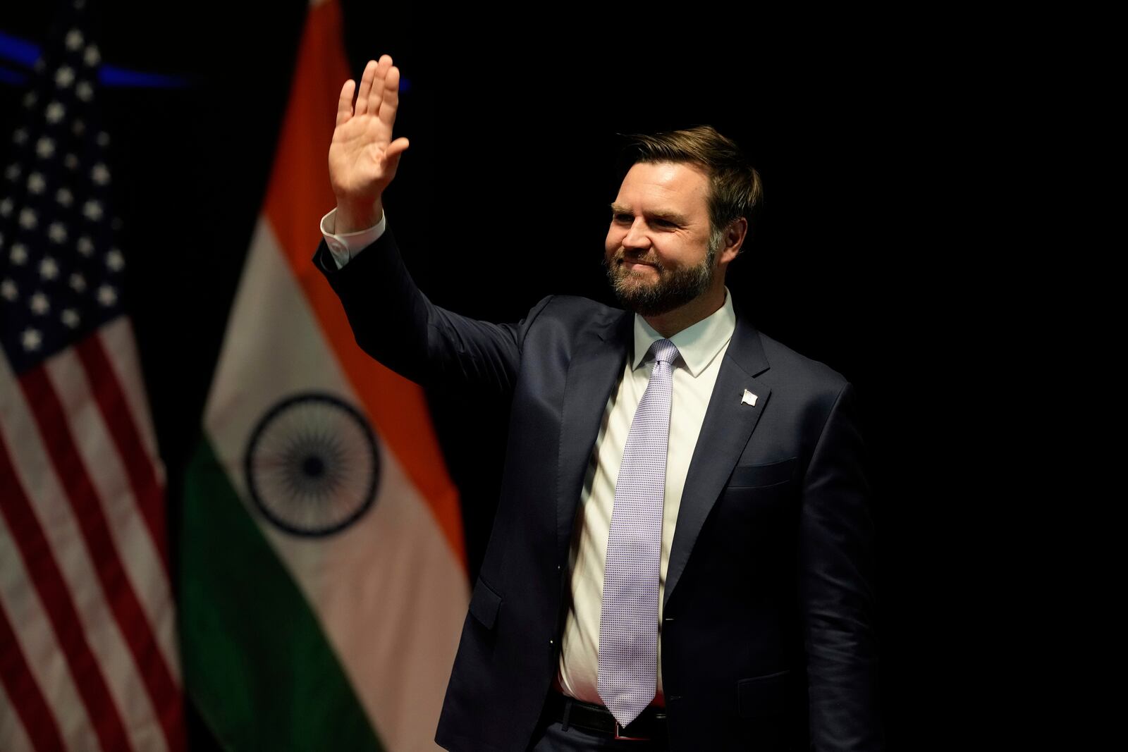 U.S. Vice President JD Vance waves at the audience after speaking at the Rajasthan International Center in Jaipur, India, Tuesday, April 22, 2025. (AP Photo/Manish Swarup)