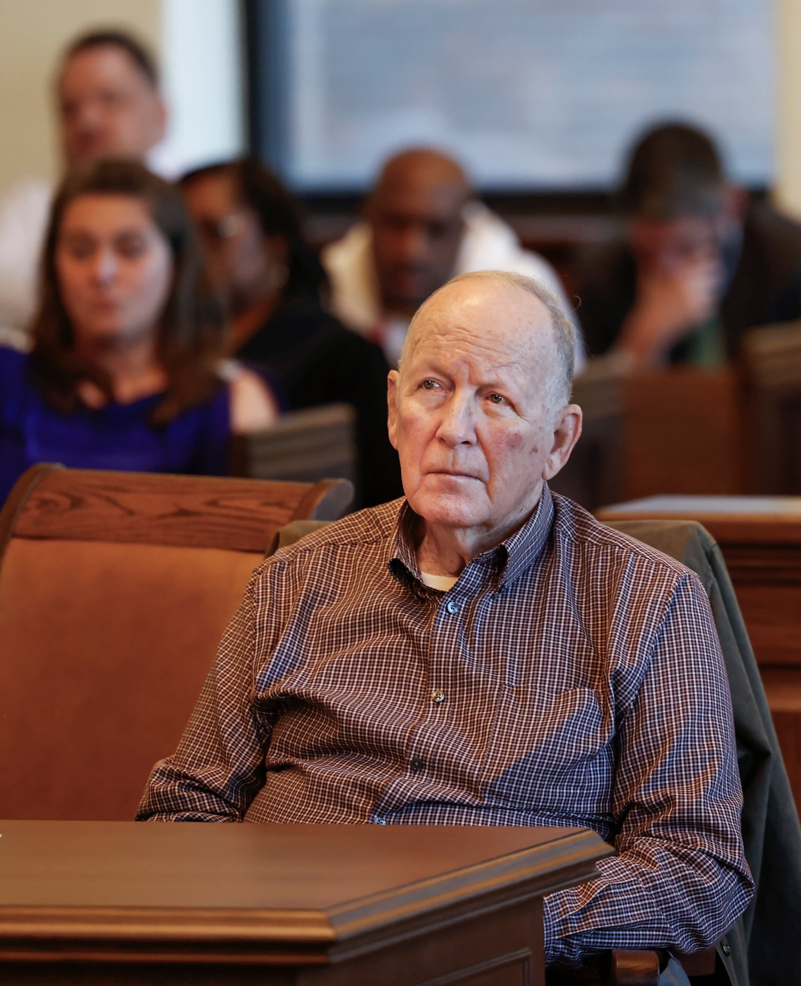 Defendant William Brock listens to opening arguments in his murder trial. The 83-year-old is accused of fatally shooting Lo-Letha “Letha” Toland-Hall, a 61-year-old Uber driver in March 2024 because he reportedly believed she was trying to rob him after scammers deceived them. JOSEPH COOKE/STAFF