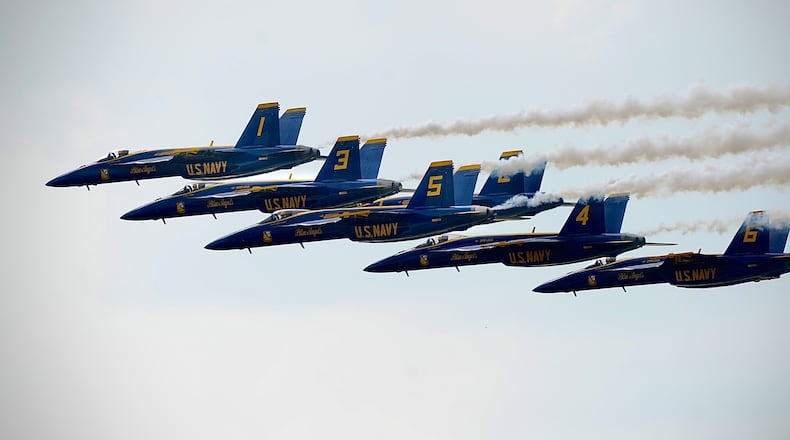 The U.S. Navy Blue Angels fly in formation as they arrive in Dayton Wednesday, June 19, 2024, ahead of the CenterPoint Energy Dayton Air Show this weekend at the Dayton International Airport. MARSHALL GORBY\STAFF