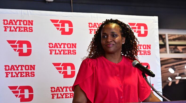 Tamika Williams-Jeter speaks at a press conference at UD Arena on Monday, March 28, 2022, as she's introduced as the new Dayton women's basketball coach. Photo by Erik Schelkun