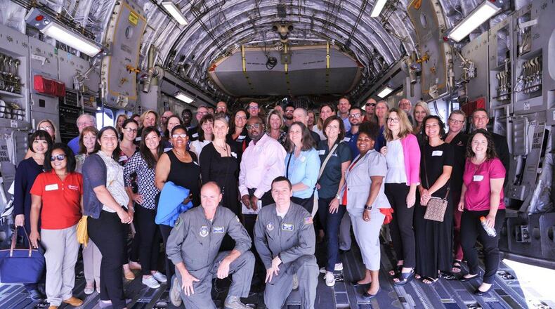 Guests from the Miami Valley Higher Education Consortium took a look inside one of the 445th Airlift Wing’s C-17 at Wright-Patterson Air Force Base. The plane visit was part of an all-day tour that took place Aug. 6. (U.S. Air Force photo/Pamela Piccoli)
