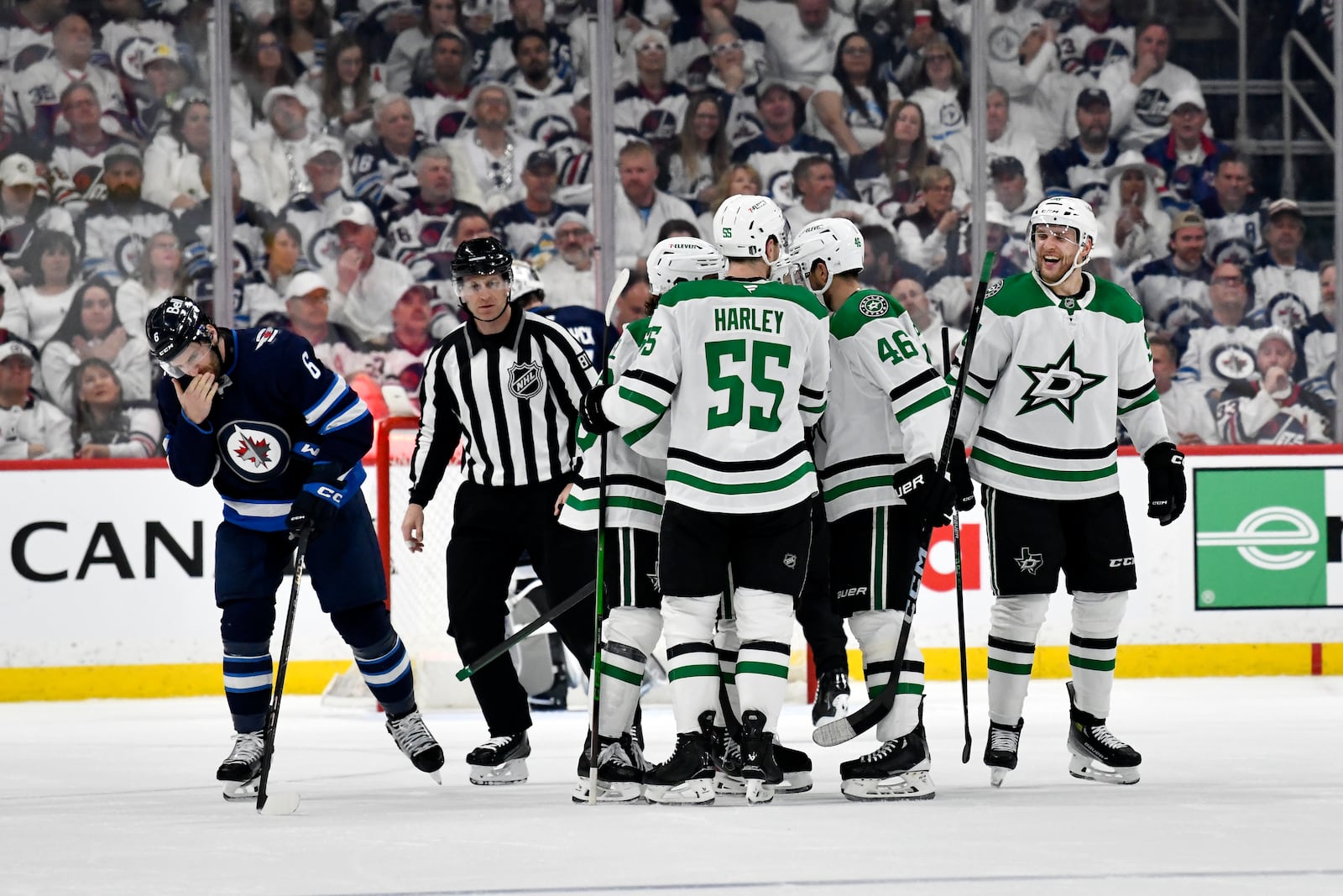 Dallas Stars' Mikko Rantanen, right, celebrates his goal against the Winnipeg Jets with teammates during the second period of an NHL hockey playoff game in Winnipeg, Manitoba, Wednesday, May 7, 2025. (Fred Greenslade/The Canadian Press via AP)