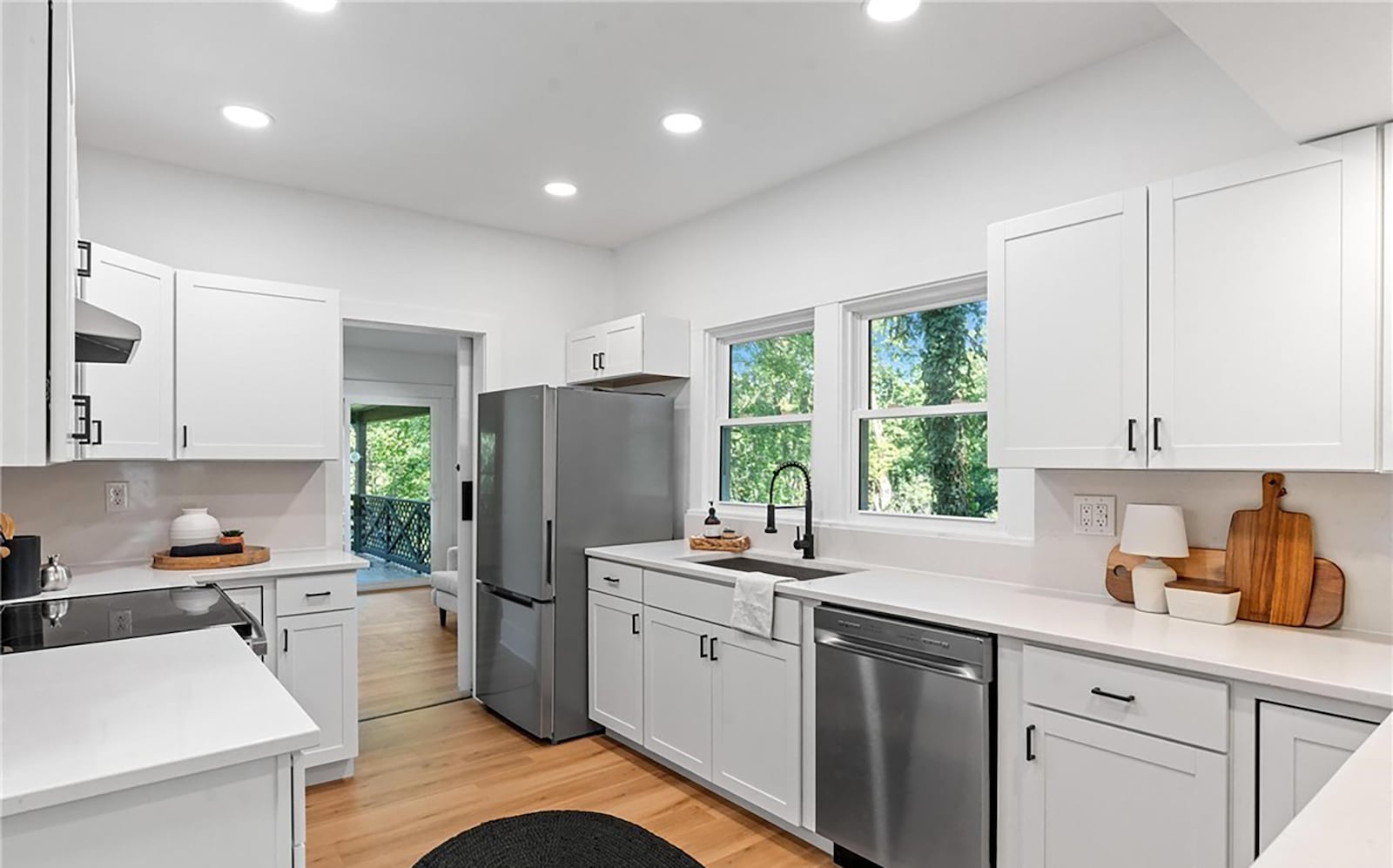 The kitchen is completely updated with white cabinets and stainless appliances. It also has Luxury Vinyl Plank flooring. CONTRIBUTED
