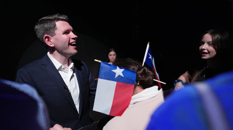 Texas Democratic Senate candidate Texas state Rep. James Talarico, D-Austin, meets with attendees after speaking for the first time since winning the Democratic nomination in Austin, Wednesday, March 4, 2026. (AP Photo/Eric Gay)