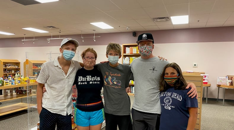 The Dayton Mall is partnering with For Love of Children (FLOC) to provide basic items for the needy. Volunteers, like those pictured,  are always needed. CONTRIBUTED