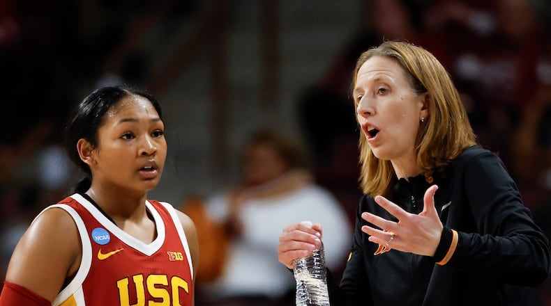 Southern California head coach Lindsay Gottlieb, right, talks to guard Malia Samuels (10) during the second half against Clemson in the first round of the NCAA college basketball tournament, Saturday, March 21, 2026, in Columbia, S.C. (AP Photo/Nell Redmond)
