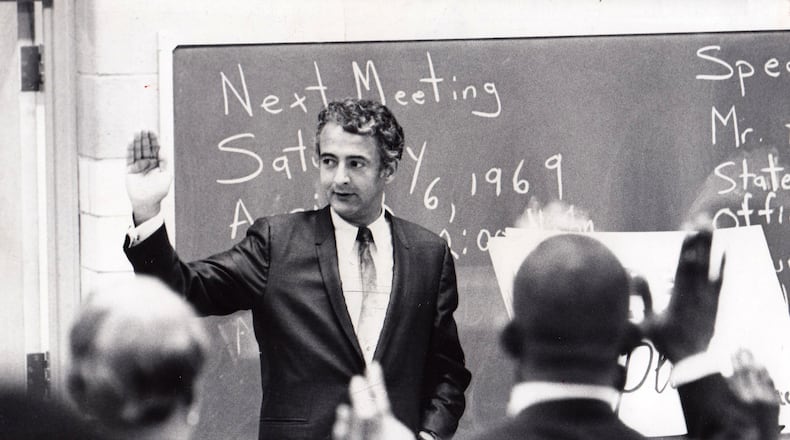 Judge Arthur O. Fisher swears in new members of the new Model City Community Council in 1969. DAYTON DAILY NEWS ARCHIVE