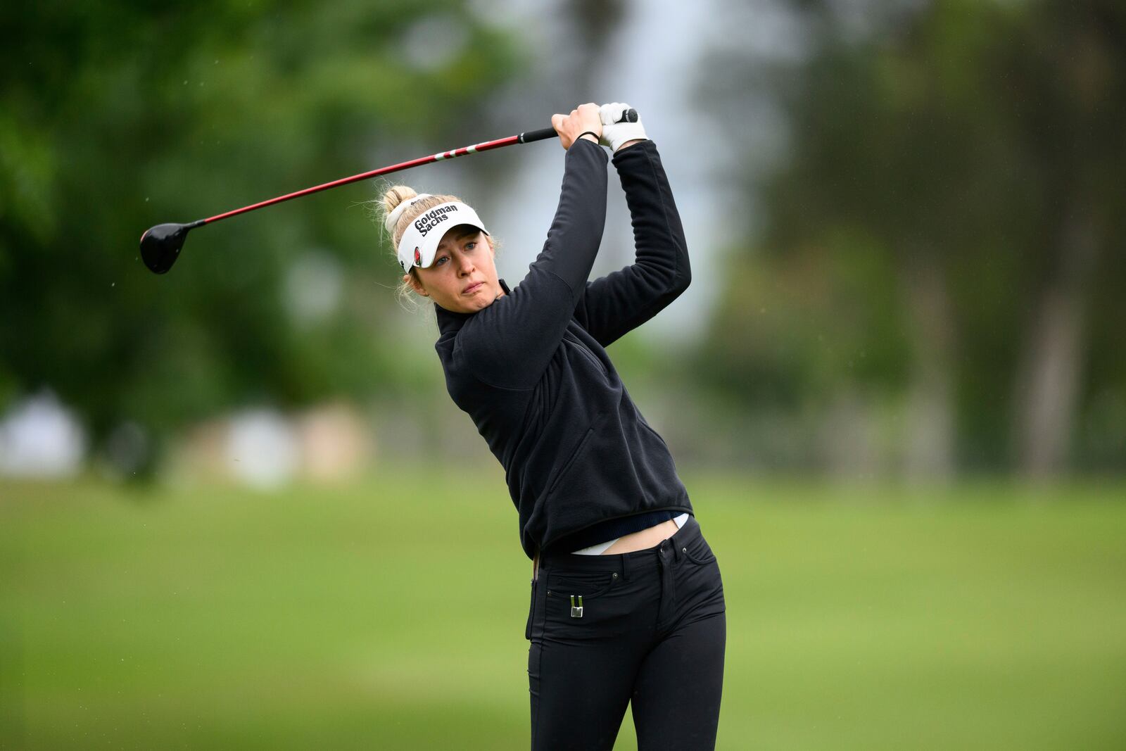 Nelly Korda hits from the 11th fairway during the first round of the LPGA's JM Eagle LA Championship golf tournament at El Caballero Country Club Thursday, April 17, 2025, in Los Angeles. (AP Photo/William Liang)