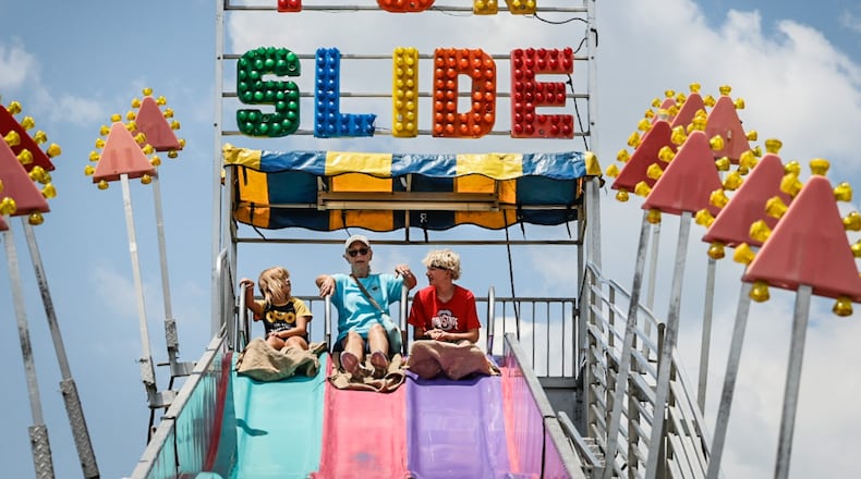 Montgomery County fairgoers ride the fun slide. The fair returns July 7-13, 2024. JIM NOELKER/STAFF