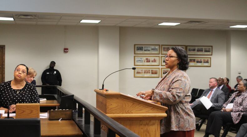 Vernetta Mitchell, senior consult with MGT Consulting, discusses the disparity study at a recent Dayton City Commission meeting. CORNELIUS FROLIK / STAFF