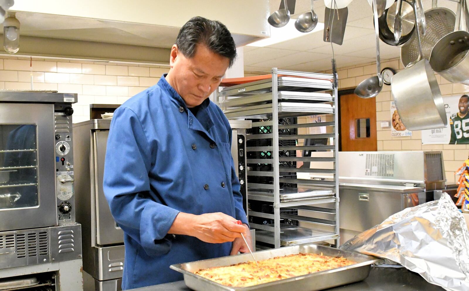 Art Chin, former owner of Greenfire Bistro in Tipp City and previously of Chin's Oriental Grill in downtown Dayton, now oversees the kitchen at Broadway Elementary School in Tipp City. He is our Daytonian of the Week. CONTRIBUTED
