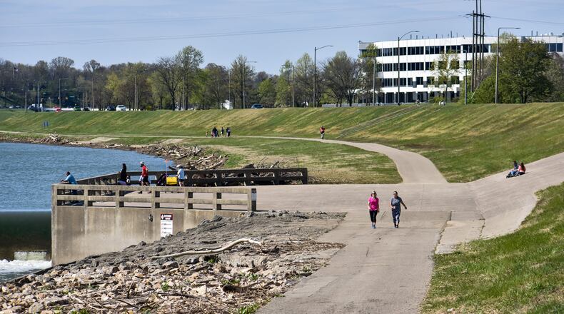 A sunny day brought a lot of people out to the bike path along the Great Miami River Wednesday, April 22 in Hamilton. NICK GRAHAM / STAFF