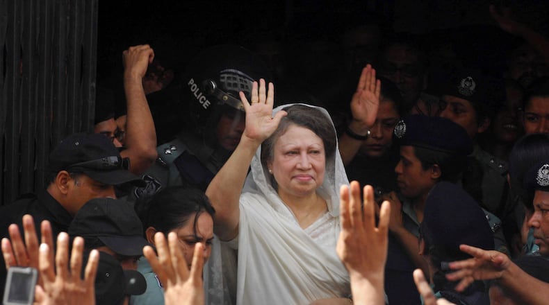 FILE - Former Bangladesh Prime Minister Khaleda Zia waves to supporters after she was arrested, in Dhaka, Bangladesh, Sept. 3, 2007. (AP Photo/Pavel Rahman, File)