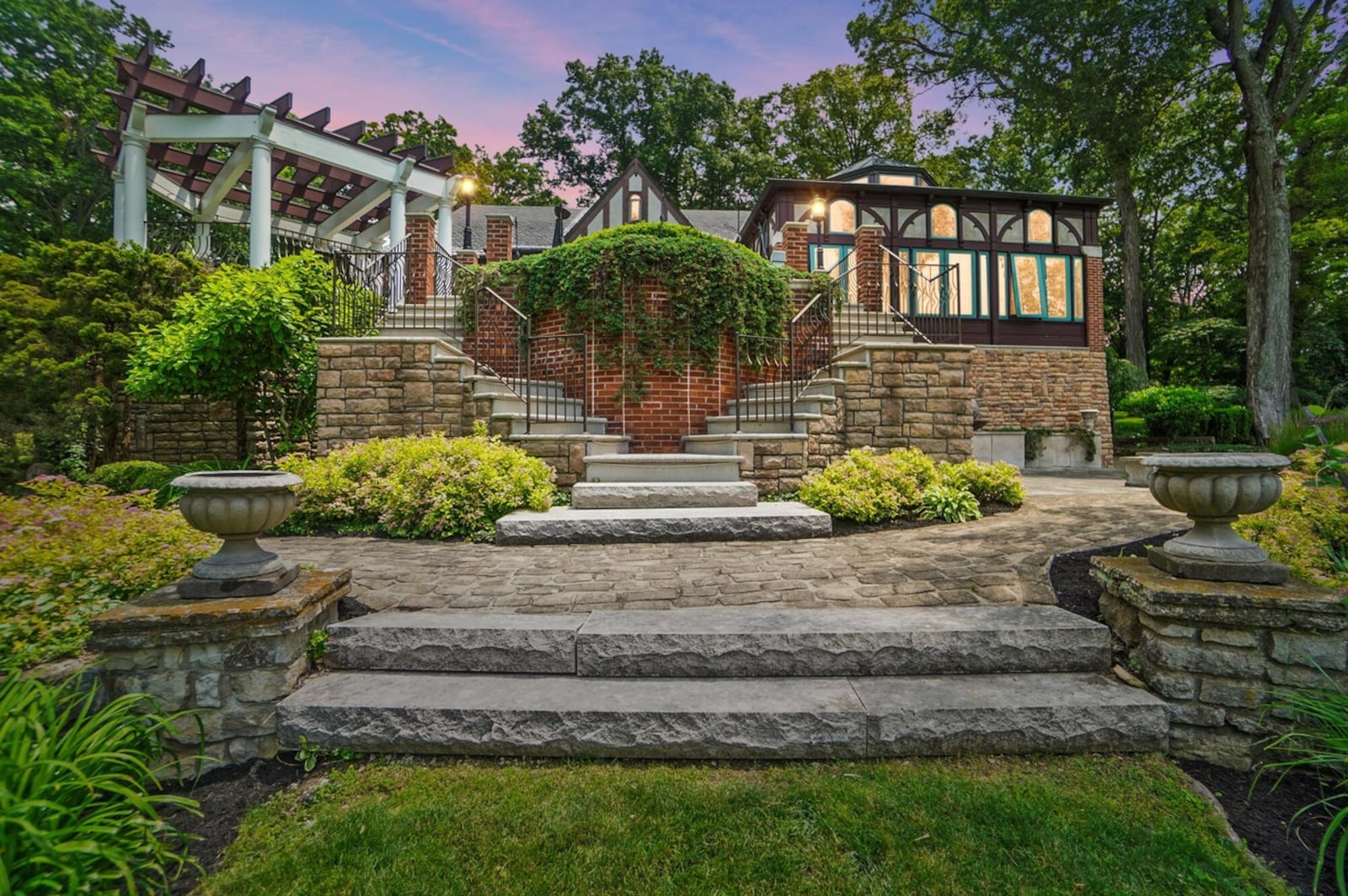 The back of the home includes a multi level patio with two pergolas, a large stone patio and smaller patios throughout the property. CONTRIBUTED
