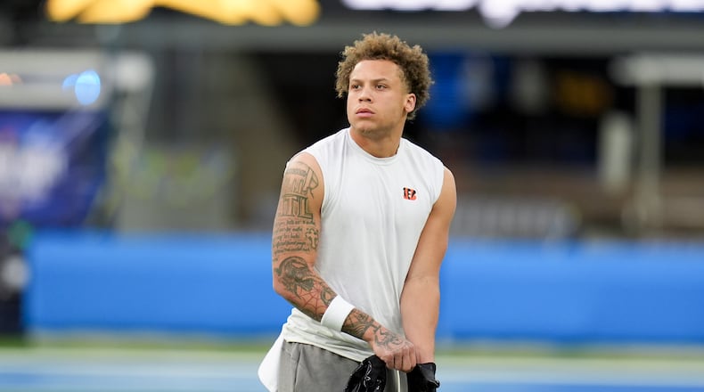 Cincinnati Bengals wide receiver Jermaine Burton warms up before an NFL football game against the Los Angeles Chargers, Sunday, Nov. 17, 2024, in Inglewood, Calif. (AP Photo/Gregory Bull)