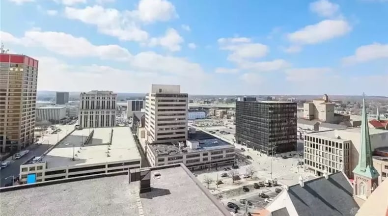 Spacious outdoor living space and a wall of windows allow for sunsets and western Dayton skyline views from this condominium located within Performance Place. Listed for $375,000 by Anne Goss of Sibcy Cline Realtors, the condominium at 109 N. Main St., unit 1406 southwest, has about 1,750 square feet of living space. The unit includes two-car, side-by-side parking spaces, a private climate-controlled storage room, use of the building’s exercise room, guest suite and secured lobby entrance next to the Schuster Center. PHOTOS COURTESY OF DAYTON REALTORS. To see other listings, visit DaytonDailyNews.com/homes